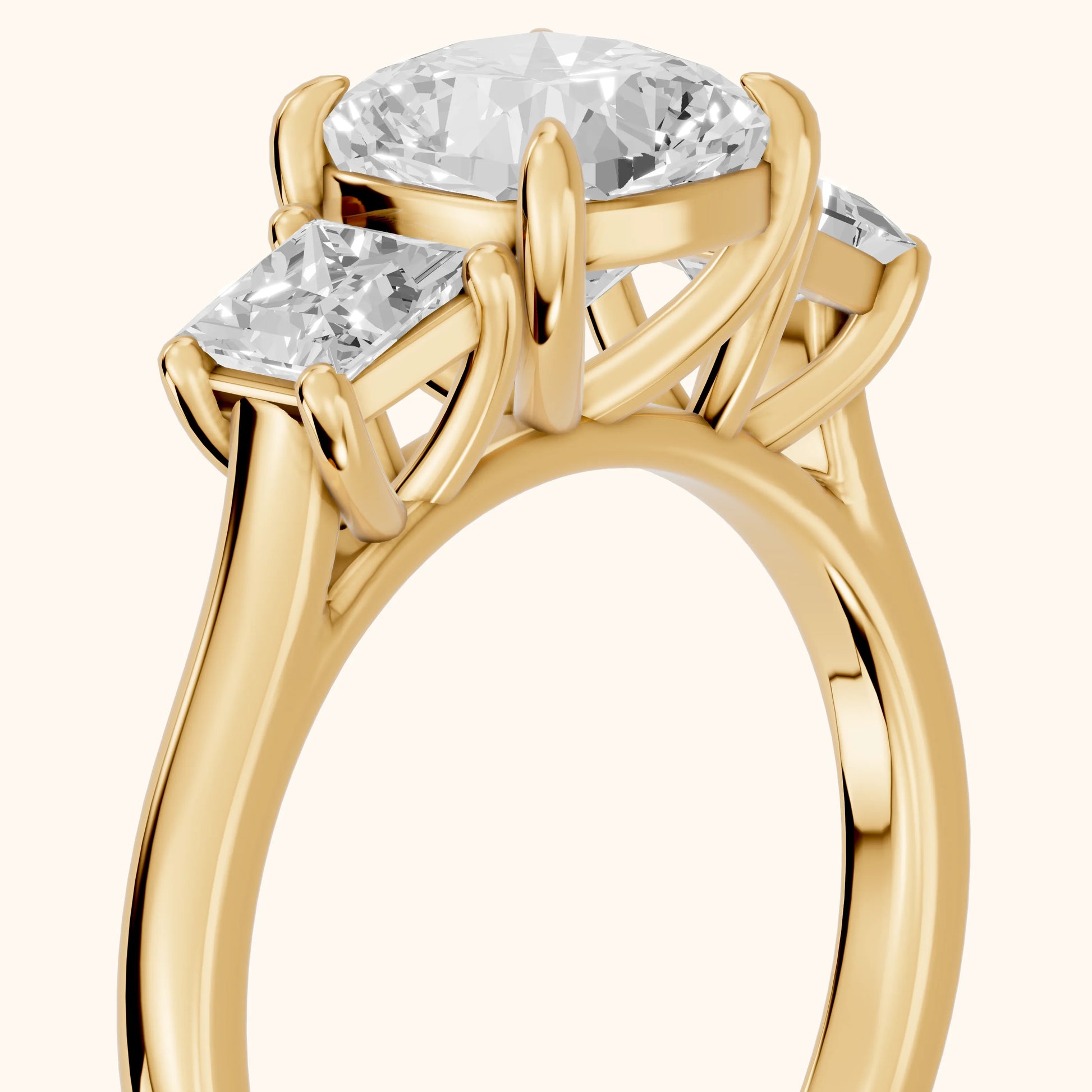 Sienna Three-Stone Cushion Diamond Ring in Yellow Gold - slant-view.webp