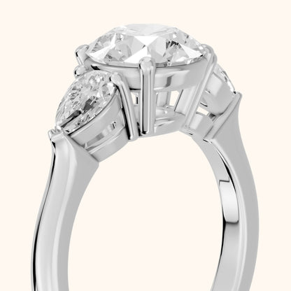 Mirabel Three-Stone Round Diamond Engagement Ring in Platinum - slant-view.webp