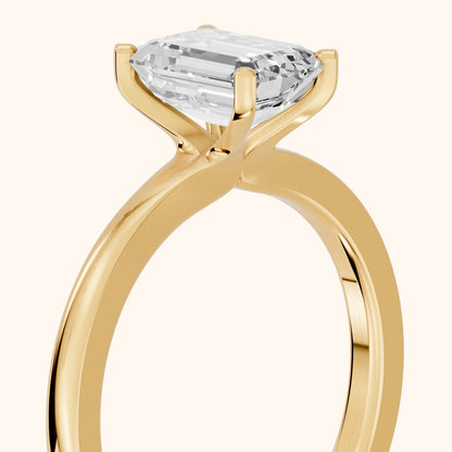 Matilda Cathedral Solitaire Emerald Diamond Engagement Ring in Yellow Gold - slant-view.webp