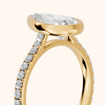 Cora Bezel Pavé Pear Diamond Ring in Yellow Gold - slant-view.webp
