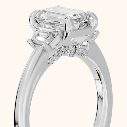 Eureka Trapezoid Three-Stone Emerald Diamond Engagement Ring in Platinum - slant-view.webp