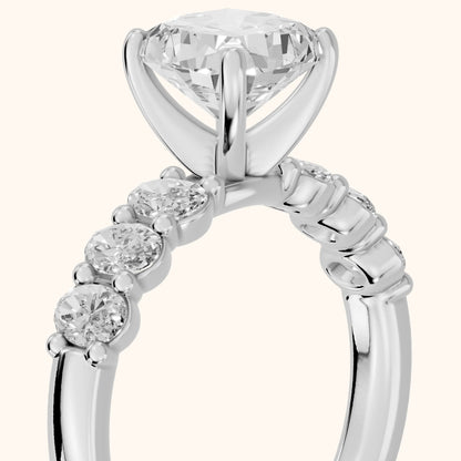 Kiera Graduated Seven-Stone Cushion Diamond Engagement Ring in Platinum - slant-view.webp