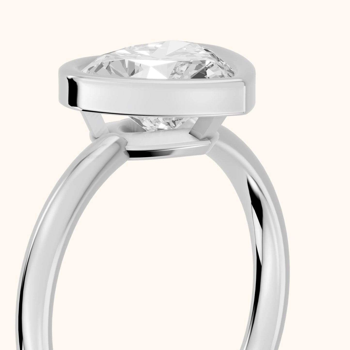 Maeve Bezel Solitaire Heart Diamond Ring in Platinum - slant-view.webp