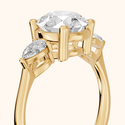 Faye Three-Stone Trellis Round Diamond Ring in Yellow Gold - slant-view.webp