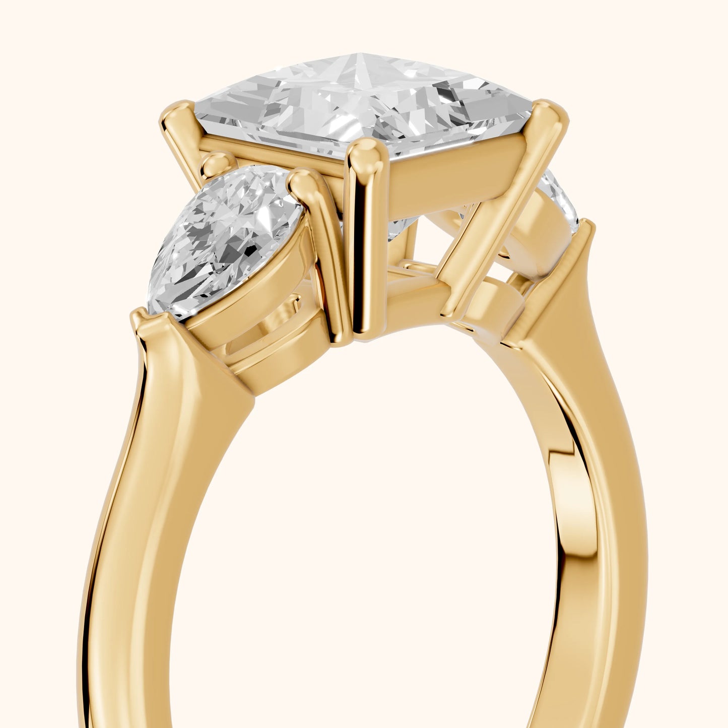 Mirabel Three-Stone Princess Diamond Engagement Ring in Yellow Gold - slant-view.webp