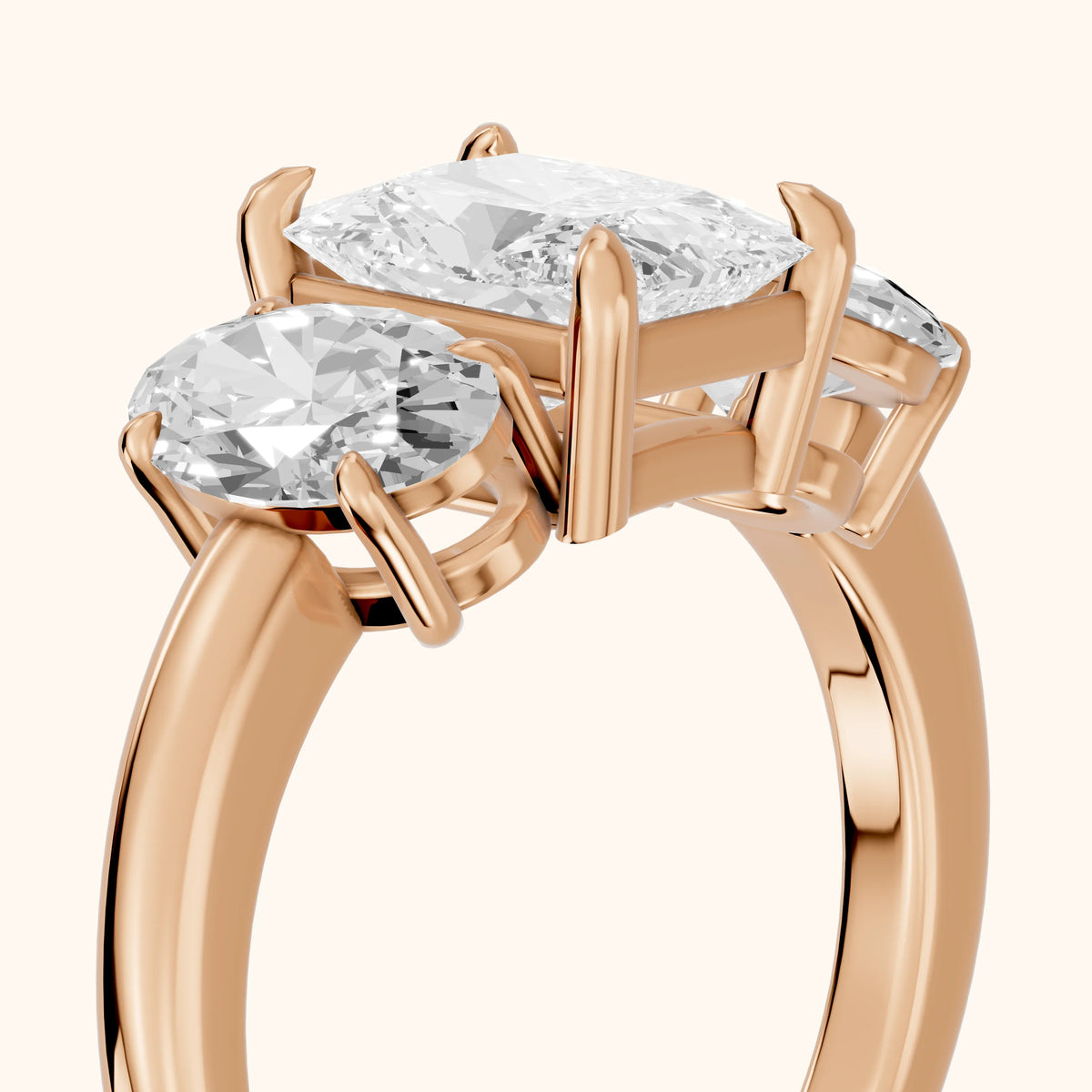Lila Three-Stone Radiant Diamond Engagement Ring in Rose Gold - slant-view.webp
