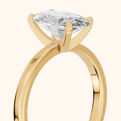 Liana Solitaire Claw Prong Oval Diamond Engagement Ring in Yellow Gold - slant-view.webp