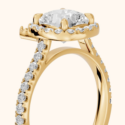 Amara Halo Claw Prong Cushion Diamond Ring in Yellow Gold - slant-view.webp