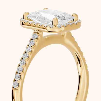 Joy Halo Pavé Radiant Diamond Engagement Ring in Yellow Gold - slant-view.webp