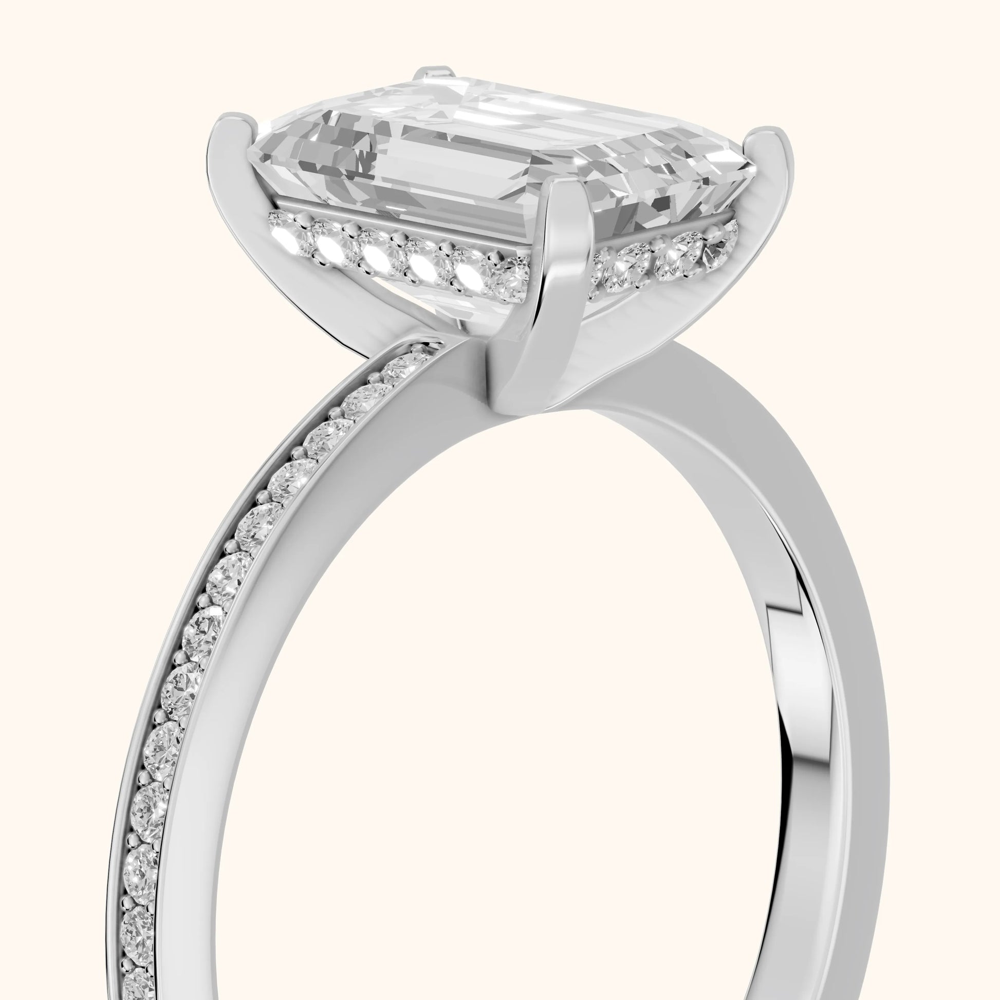 Naia Hidden Halo Emerald Diamond Ring in Platinum - slant-view.webp