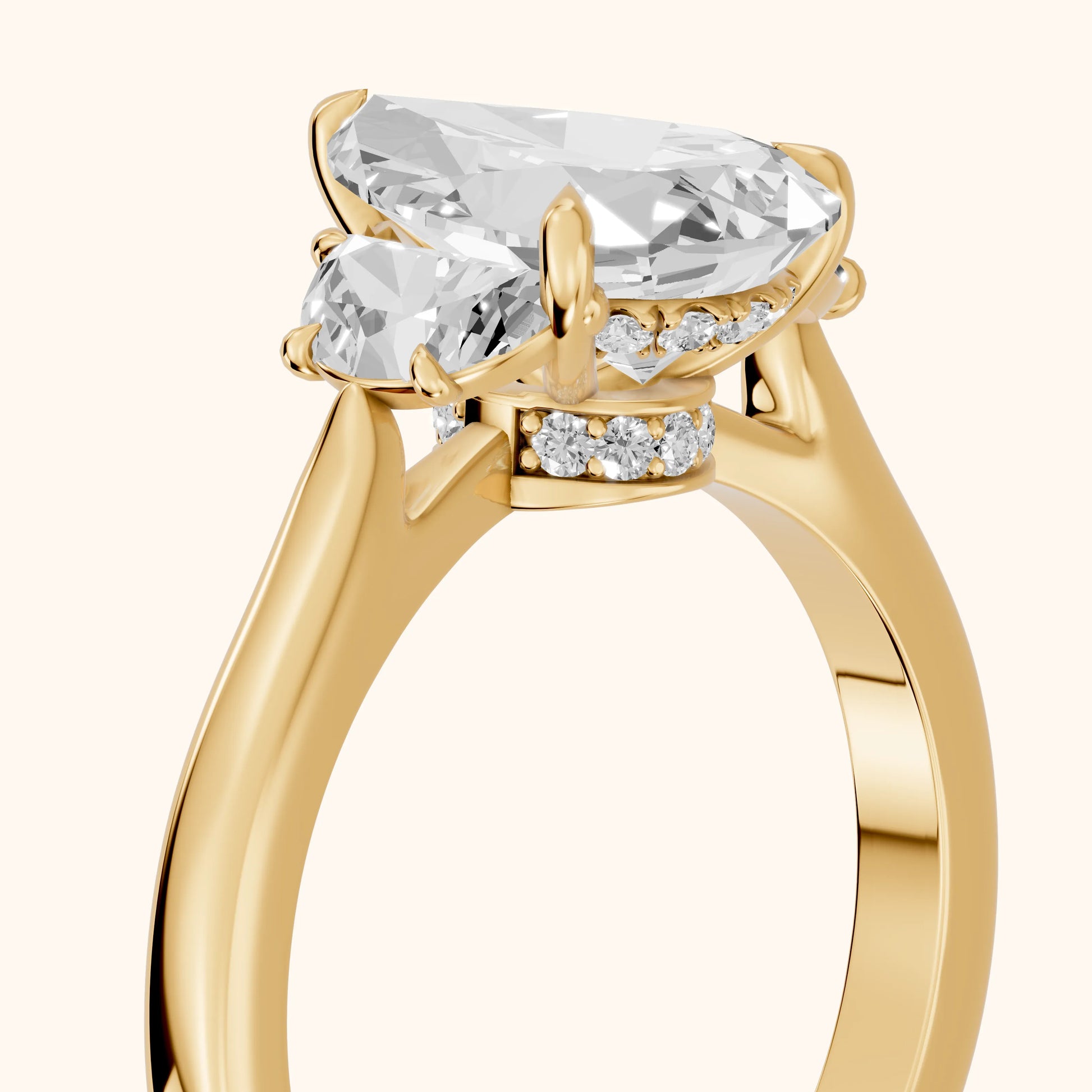 Romy Three-Stone Pear Diamond Engagement Ring in Yellow Gold - slant-view.webp