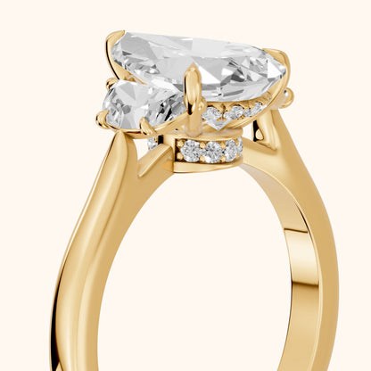 Romy Three-Stone Pear Diamond Engagement Ring in Yellow Gold - slant-view.webp