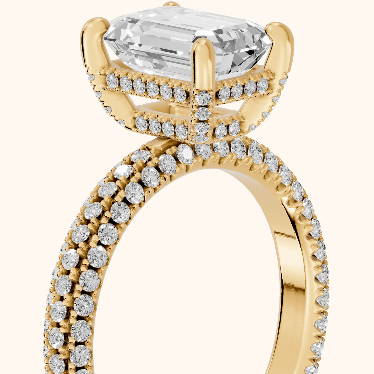Mira Hidden Halo Micropavé Emerald Diamond Engagement Ring in Yellow Gold - slant-view.webp
