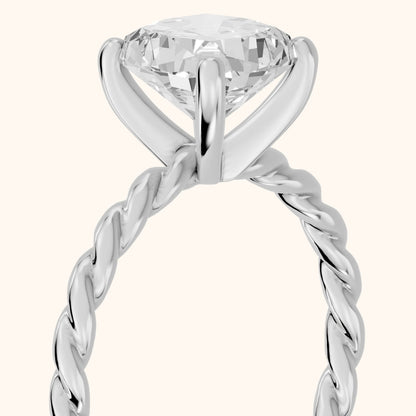 Robyn Twist Solitaire Cushion Diamond Engagement Ring in Platinum - slant-view.webp