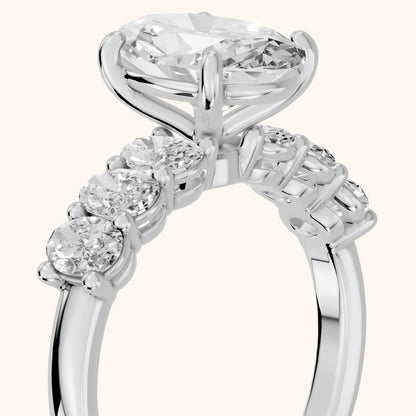 Maple Graduated Seven-Stone Oval Diamond Engagement Ring in Platinum - slant-view.webp