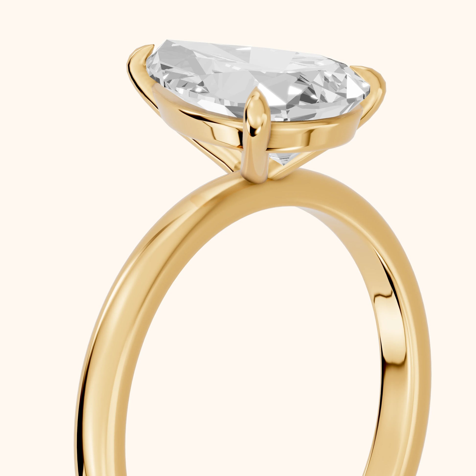 Lyla Petite Solitaire Pear Diamond Engagement Ring in Yellow Gold - slant-view.webp