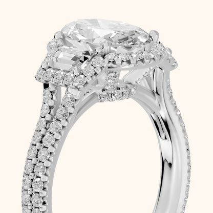 Ronan Three-Stone Halo Oval Diamond Engagement Ring in Silver - slant-view.webp