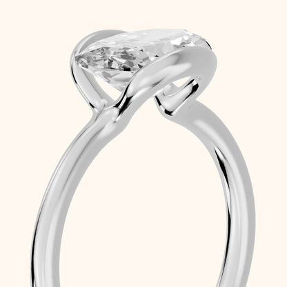 Mathilde East-West Half Bezel Oval Diamond Engagement Ring in White Gold - slant-view.webp