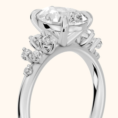Mirabelle Cluster Pear Diamond Engagement Ring in Platinum - slant-view.webp