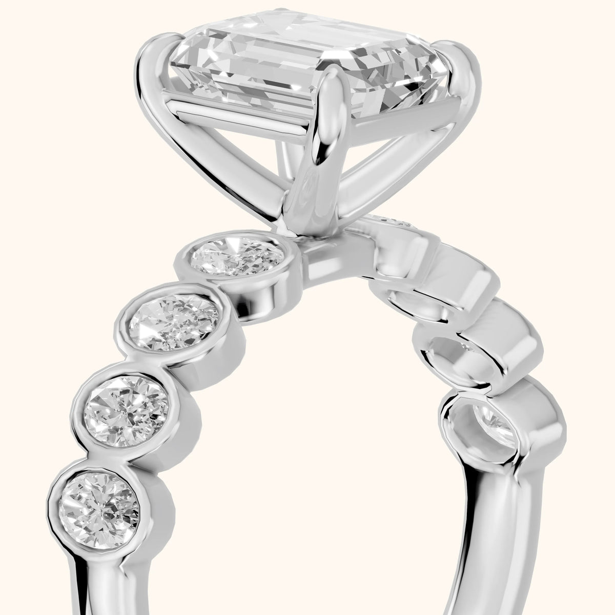 Vittoria Graduated Bezel Emerald Diamond Engagement Ring in Silver - slant-view.webp