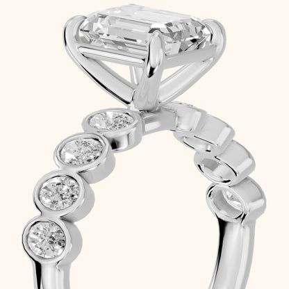 Vittoria Graduated Bezel Emerald Diamond Engagement Ring in Silver - slant-view.webp