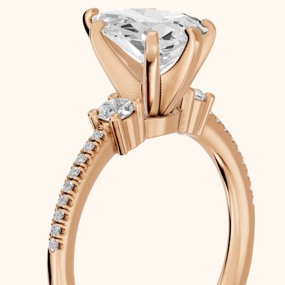 Nerissa Three-Stone Micropavé Pear Diamond Engagement Ring in Rose Gold - slant-view.webp