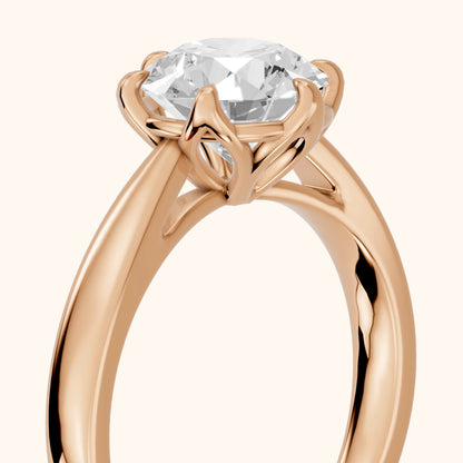 Lucia Solitaire Six-Prong Round Diamond Engagement Ring in Rose Gold - slant-view.webp