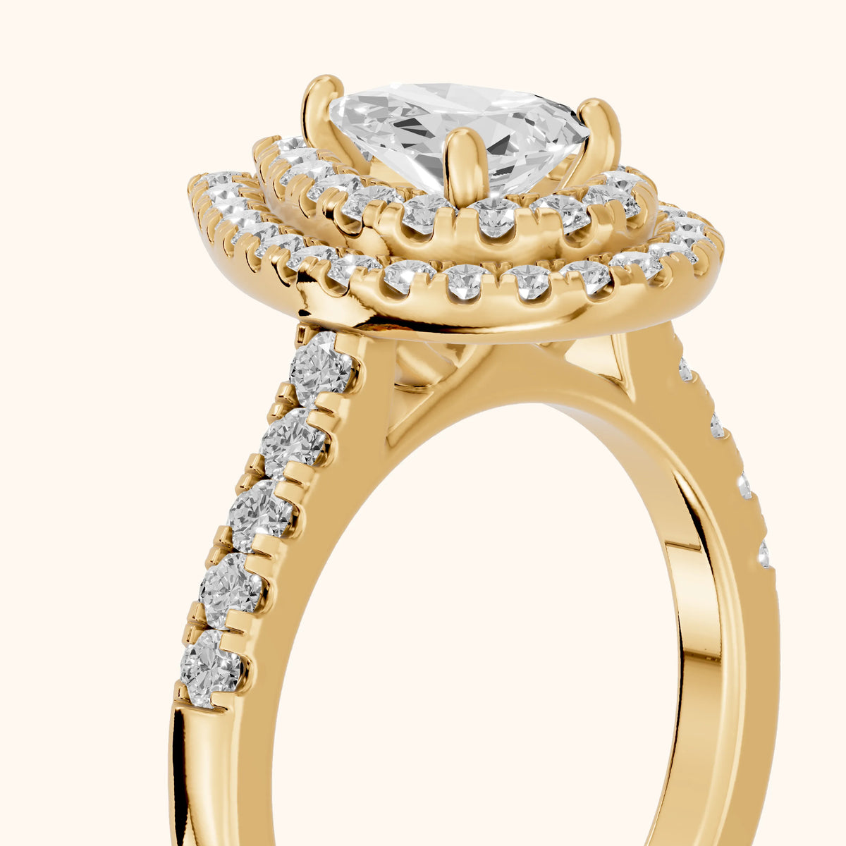 Ashby Double Halo Pavé Pear Diamond Engagement Ring in Yellow Gold - slant-view.webp