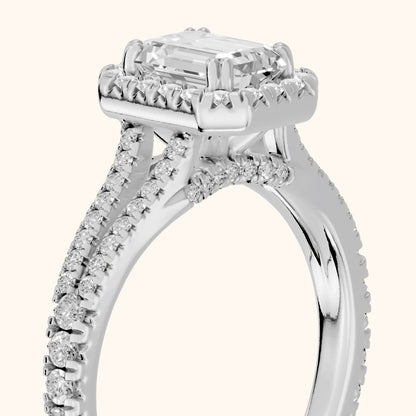 Dallas Halo Split Shank Emerald Diamond Engagement Ring in Platinum - slant-view.webp