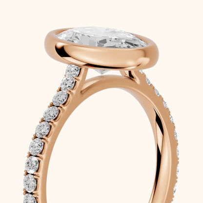 Cora Bezel Pavé Oval Diamond Ring in Rose Gold - slant-view.webp