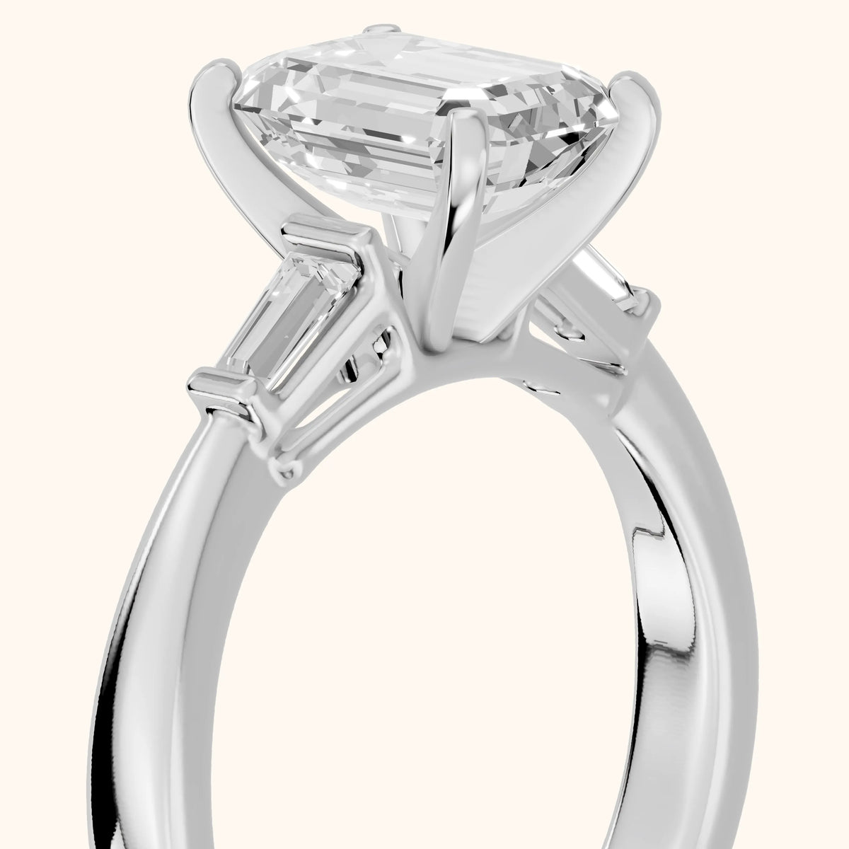 Jacinta Baguette Three-Stone Emerald Diamond Engagement Ring in Platinum - slant-view.webp