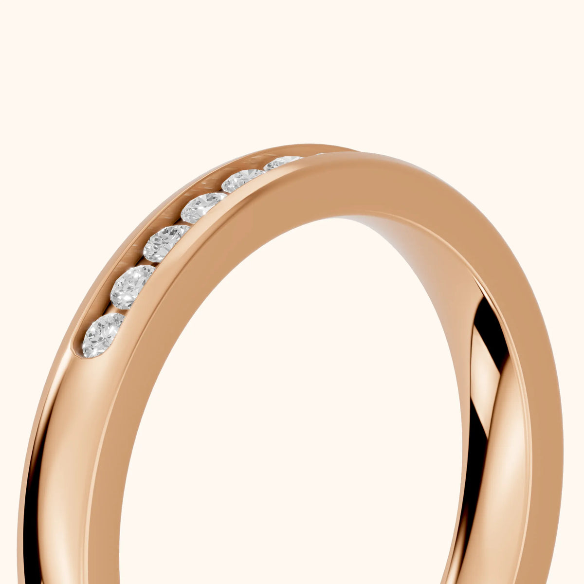 Coralie Channel Set Round Diamond Wedding Band in Rose Gold - slant-view
