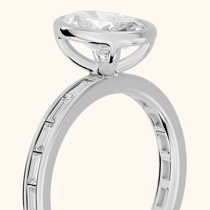 Raleigh Bezel Baguette Oval Diamond Engagement Ring in Platinum - slant-view.webp