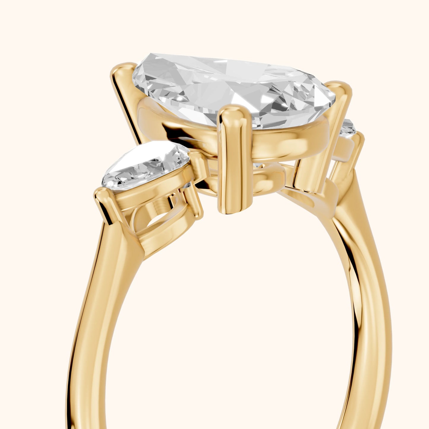 Faye Three-Stone Trellis Pear Diamond Ring in Yellow Gold - slant-view.webp
