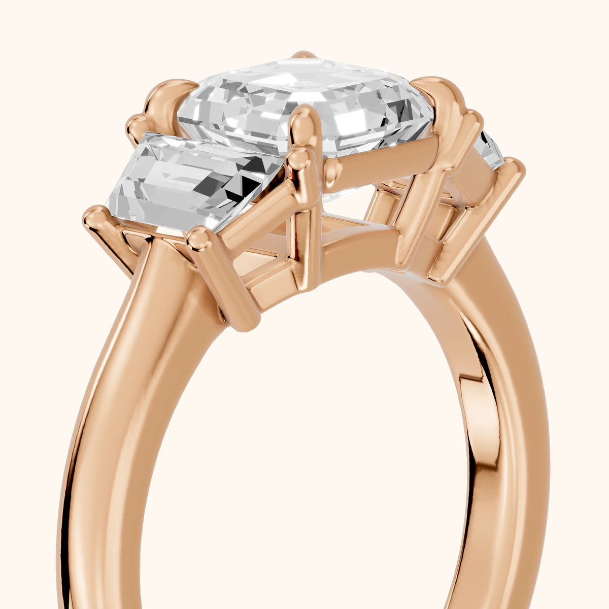 Filippa Trapezoid Three-Stone Asscher Diamond Engagement Ring in Rose Gold - slant-view.webp