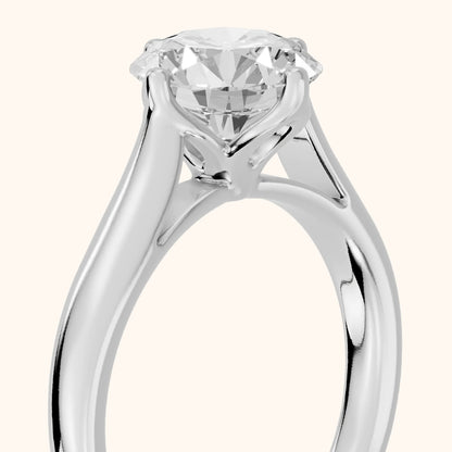 Edwina Crossover Solitaire Round Diamond Engagement Ring in White Gold - slant-view.webp