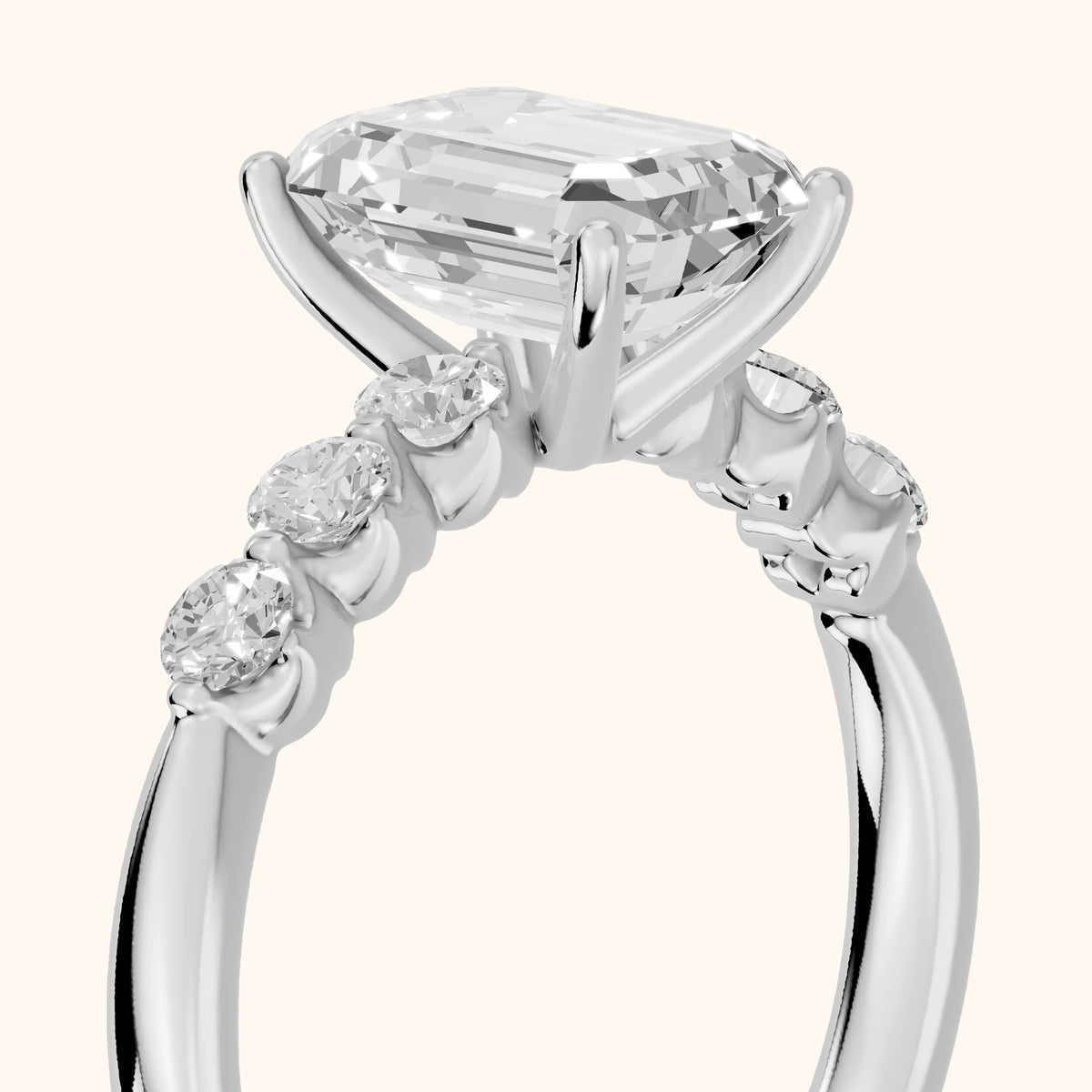 Vienna Floating Five-Stone Emerald Diamond Engagement Ring in Platinum - slant-view.webp