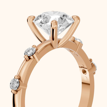 Elena Radiance Solitaire Round Diamond Engagement Ring in Rose Gold - slant-view.webp