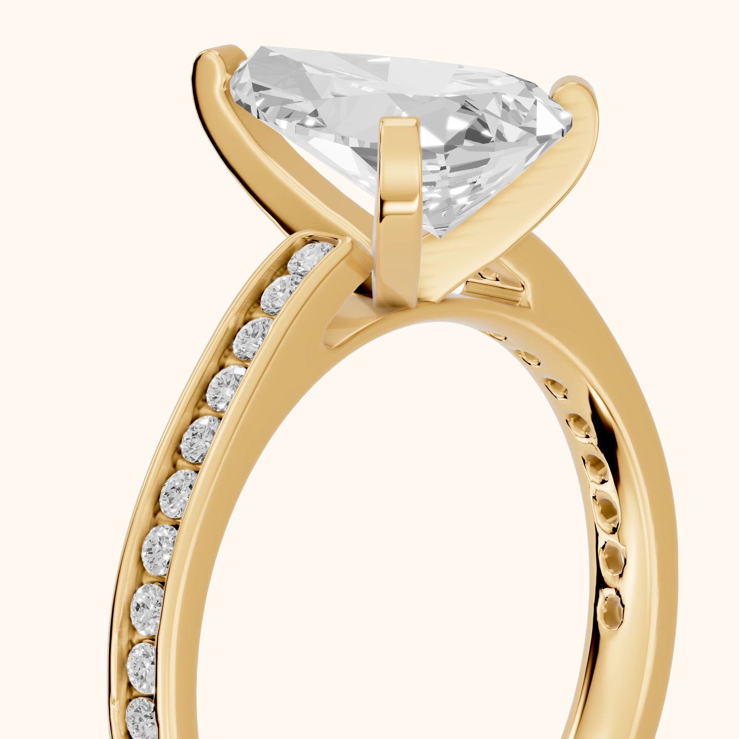 Tessa Solitaire Channel Set Pear Diamond Engagement Ring in Yellow Gold - slant-view.webp