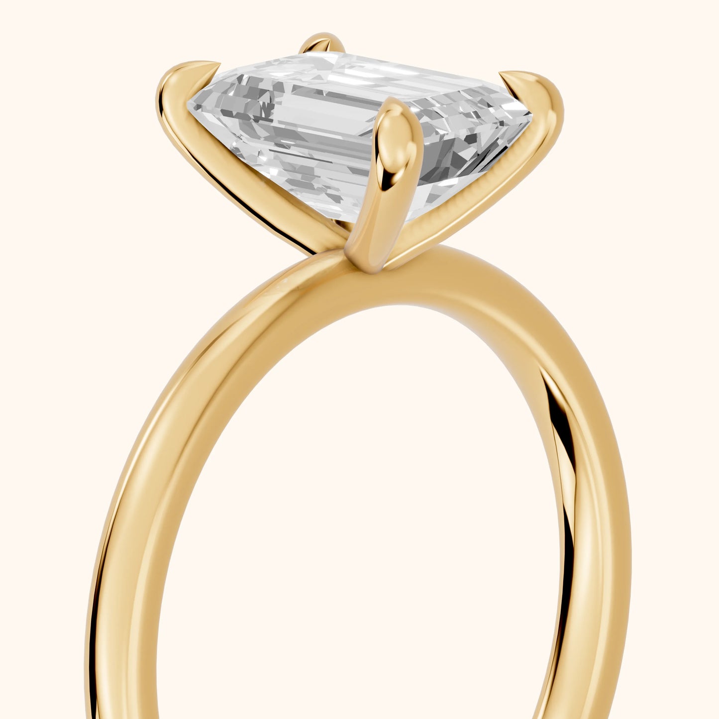 Nella Petite Solitaire Emerald Diamond Engagement Ring in Yellow Gold - slant-view.webp