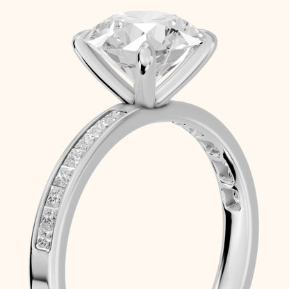 Maren Sidestone Channel Set Round Diamond Engagement Ring in Silver - slant-view.webp