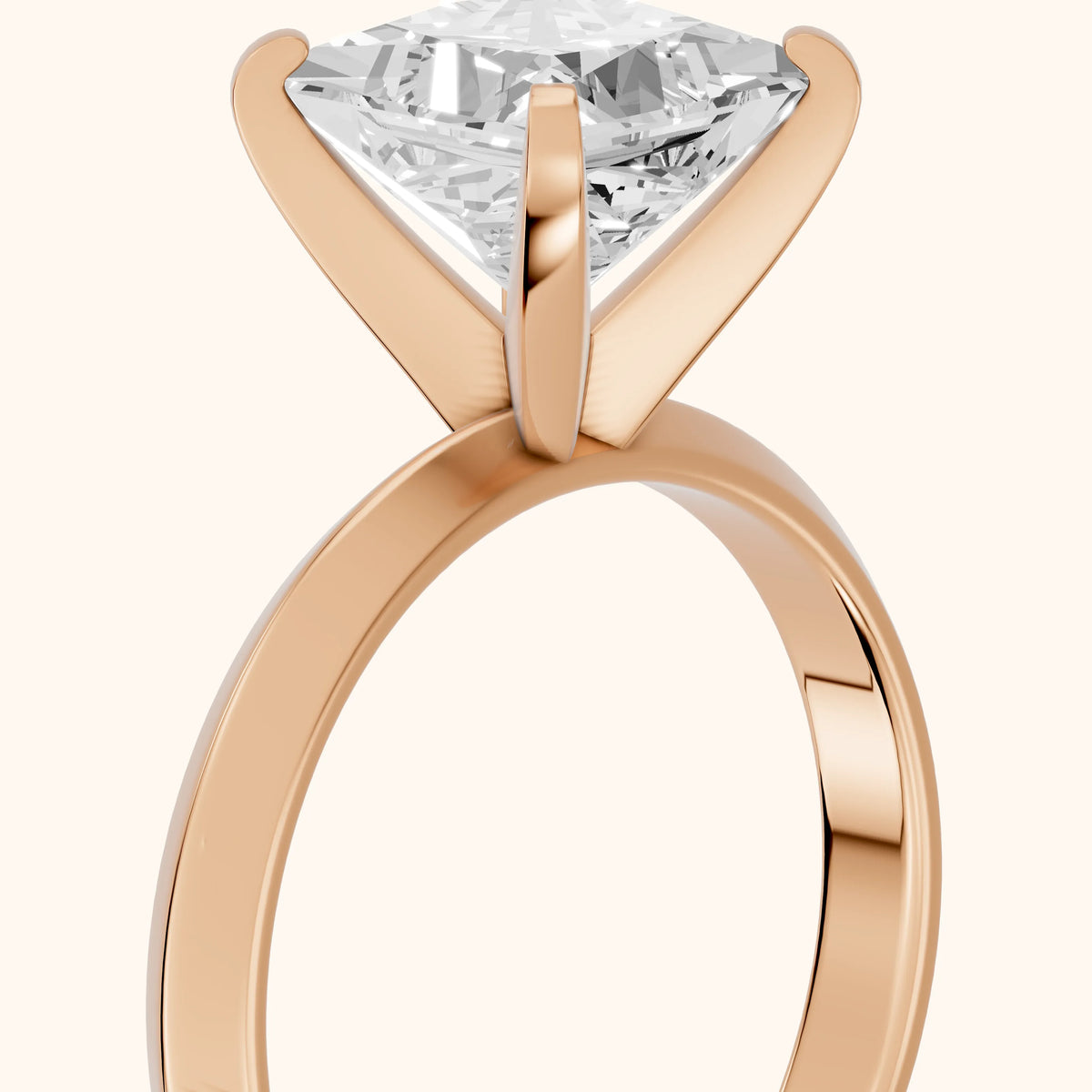 June Solitaire Knife Edge Princess Diamond Engagement Ring in Rose Gold - slant-view.webp