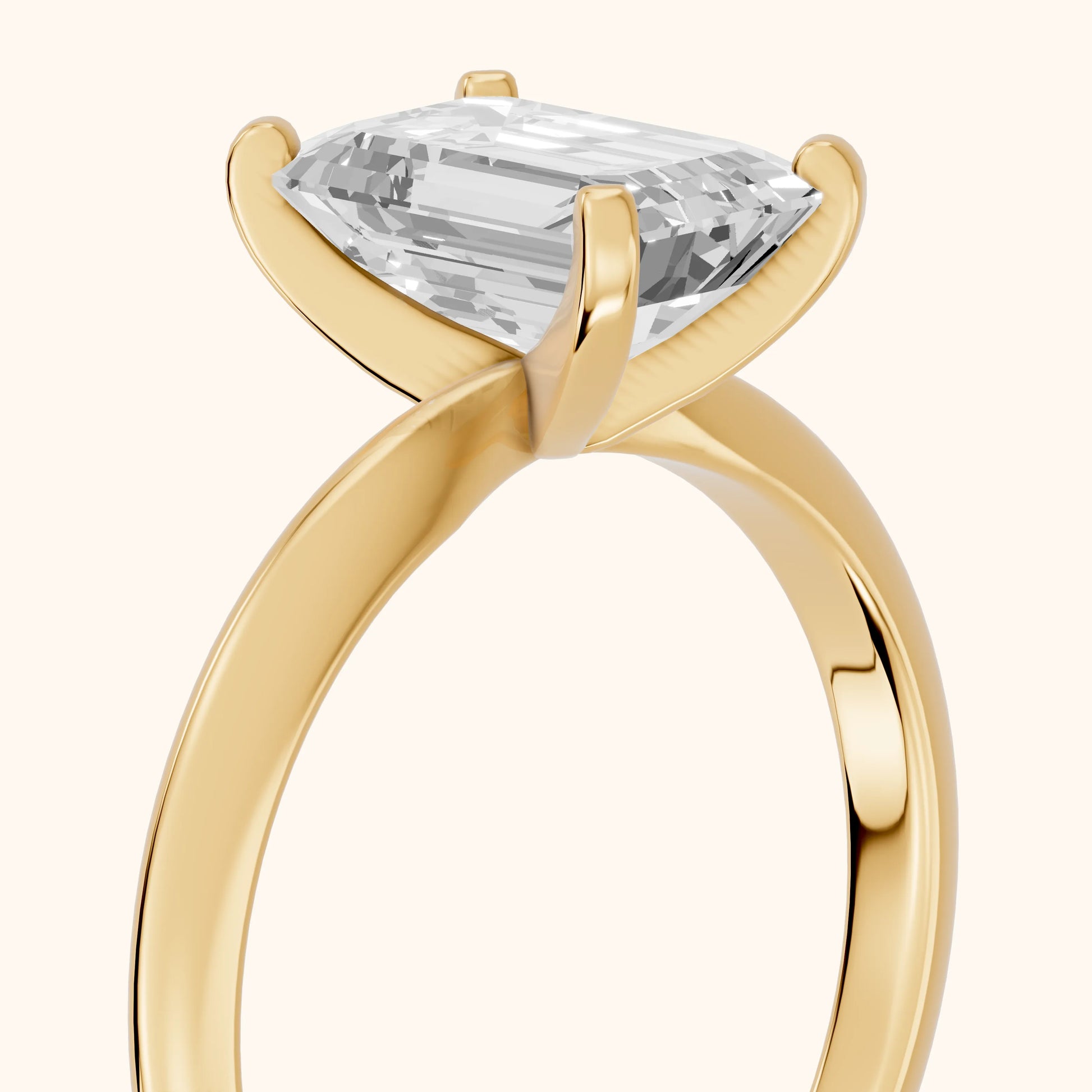 Wren Solitaire Emerald Diamond Ring in Yellow Gold - slant-view.webp