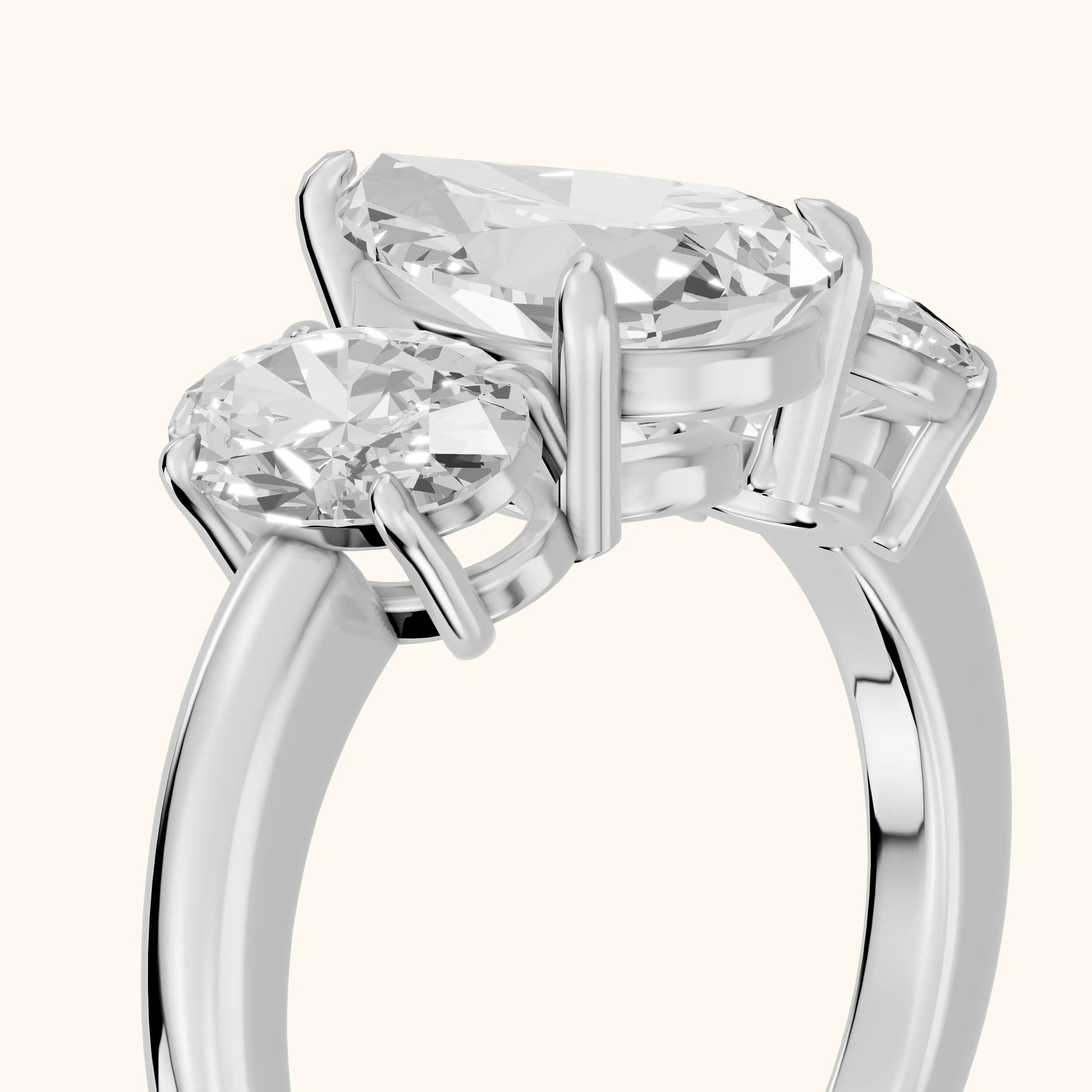 Lila Three-Stone Pear Diamond Ring in White Gold - slant-view.webp