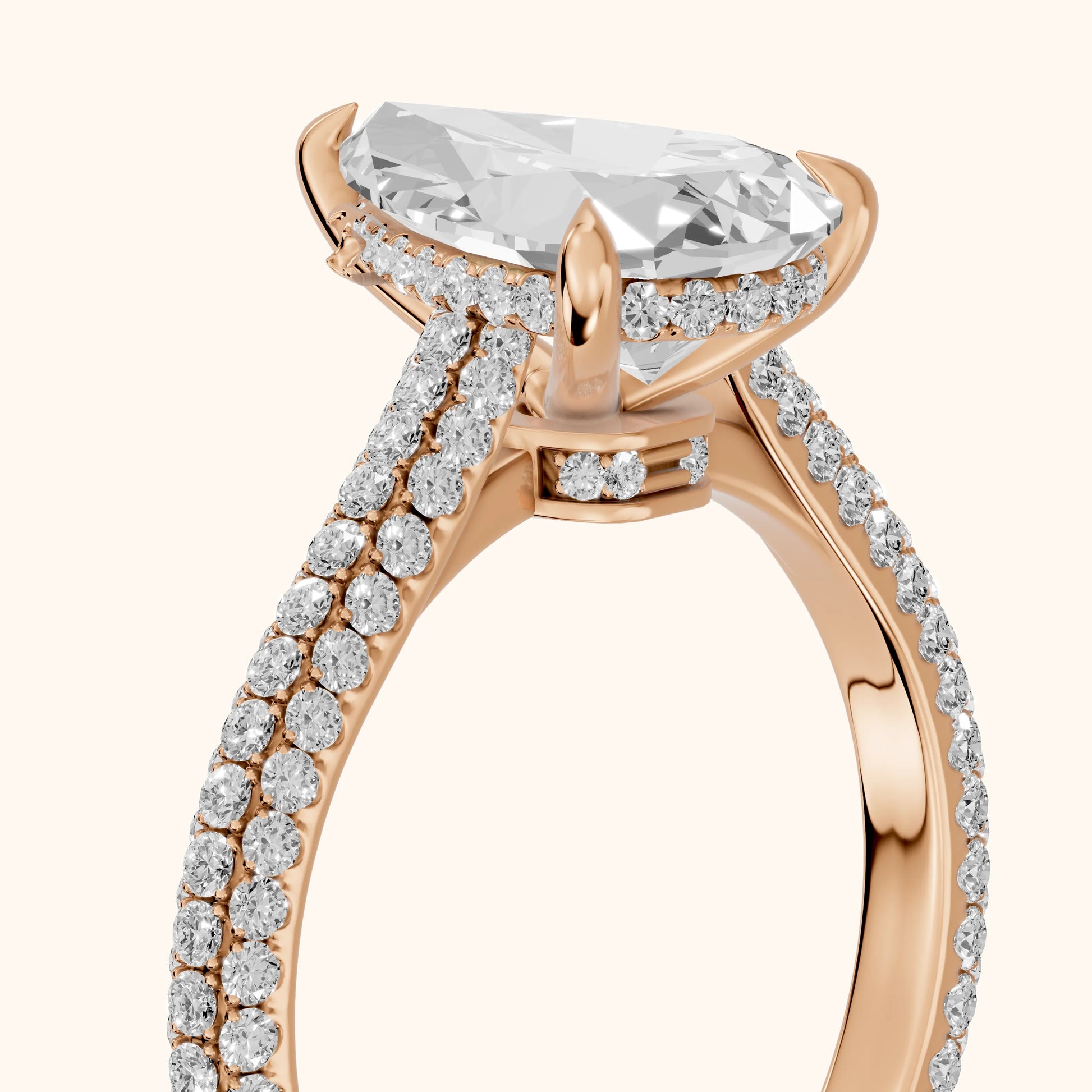 Della Hidden Halo Pavé Pear Diamond Engagement Ring in Rose Gold - slant-view.webp