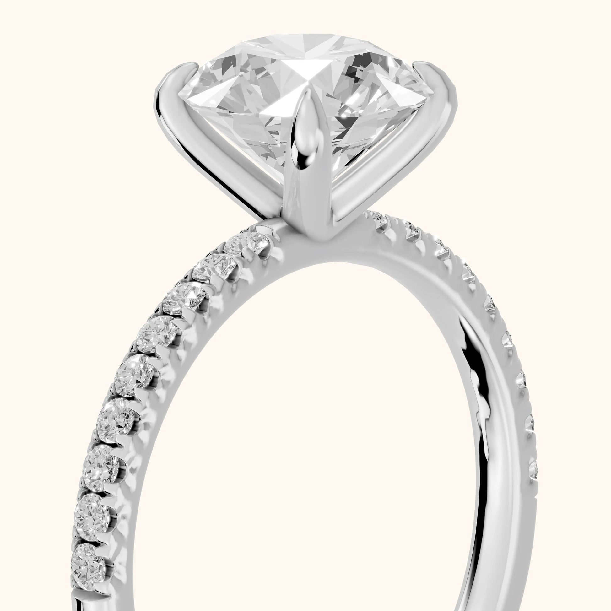 Ione Solitaire Pavé Round Diamond Engagement Ring in White Gold - slant-view.webp