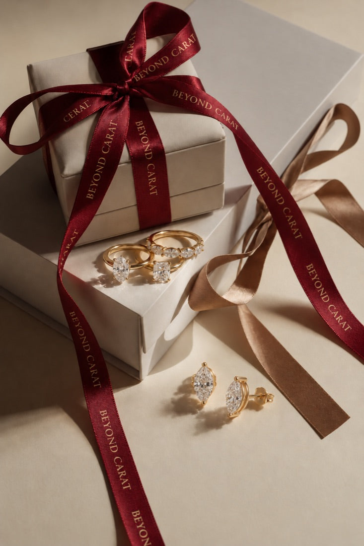 Diamond rings and earrings on a wrapped gift